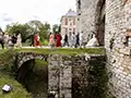 the bride, groom and guests returning from church