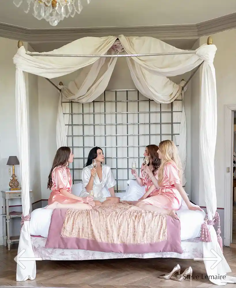 the bride and her maids in a bedroom